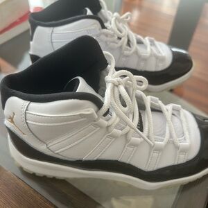 Jordan White and Black High-Top Sneakers. used once, inside the house.size 3Y.